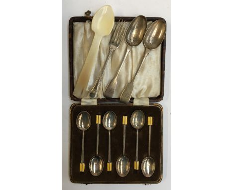 A cased set of six silver coffee spoons with yellow enamel terminals, by Marson &amp; Jones, Birmingham 1934; a teaspoon by M