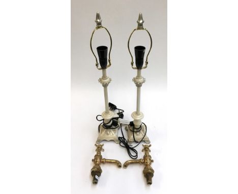 A pair of table lamps, together with a set of gilt metal and enamel bathroom taps 