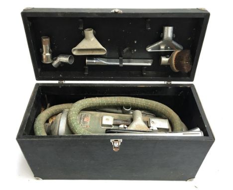 A vintage Vactric vacuum cleaner, with accessories, in wooden box 