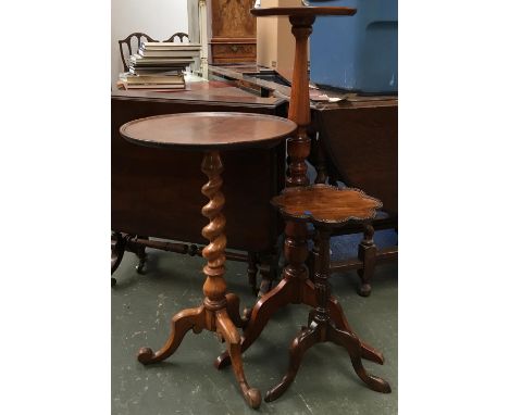 A light mahogany tripod table with fine barleytwist support, together with a small tripod table with scalloped edge, and a to