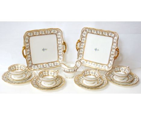 JACKSON & GOSLING 'GROSVENOR CHINA YE OLD ENGLISH' TEA SETdecorated with gilt and flowers, comprising twelve cups; twelve sau