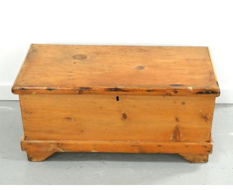 PINE BLANKET BOXwith a moulded lift up lid, standing on bracket feet, 86.5cm wide  