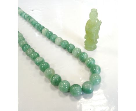 JADE COLOURED HARDSTONE BEAD NECKLACEand a small carved jade figure, 5.4cm high