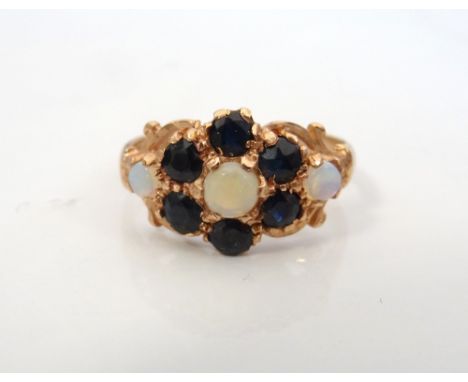 UNUSUAL SAPPHIRE AND OPAL CLUSTER RINGon nine carat rose gold shank, ring size H-I