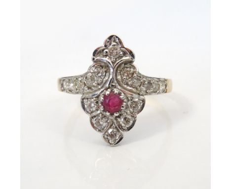 DIAMOND AND RUBY CLUSTER DRESS RINGthe central ruby approximately 0.1cts in multi diamond shaped surround, the diamonds total