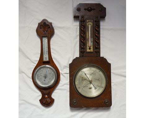 1920's 'ACME' OAK CASED WALL BAROMETERof shaped outline, the thermometer with a brass scale flanked by barley twist columns, 