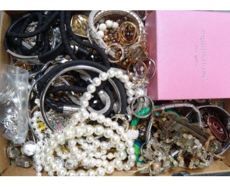 LOT OF COSTUME JEWELLERYincluding silver and other rings, a boxed 'Equilibrium' girl's bangle, simulated pearl bracelets and 