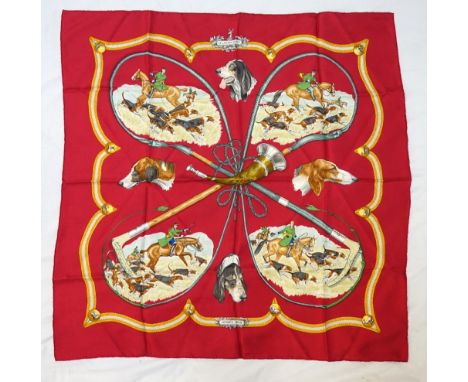 HERMES 'LE LAISSER COURRE' SILK SCARFthe hunting scenes on a burgundy ground, approximately 88cm square