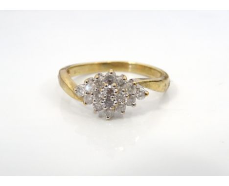 DIAMOND CLUSTER RINGthe diamonds in rhombus shaped setting totalling approximately 0.33cts, on nine carat gold shank, ring si