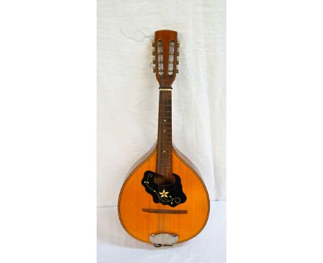 VINTAGE MANDOLINpossibly Czechoslovakian, slightly rounded back, with leather cord strap, 61cm long