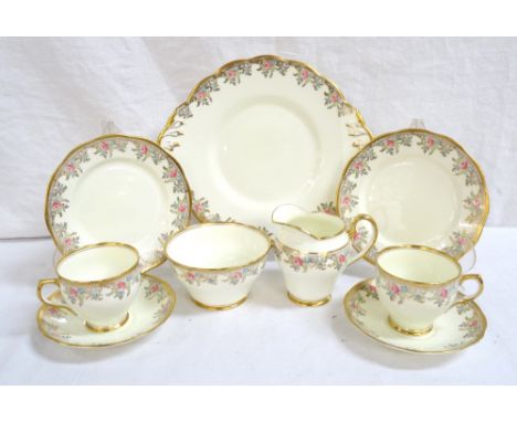SALISBURY CHINA TEA SERVICEwith floral and gilt decoration, comprising twelve cups; twelve saucers; twelve side plates; two c