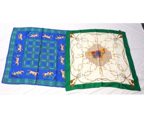 TWO CELINE PARIS SILK SCARVESone with a band of show jumping horses and riders, on a blue and green ground, approximately 85c