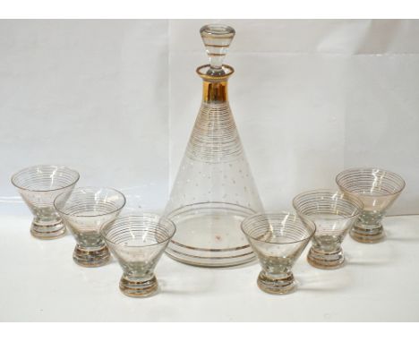 1950's GLASS LIQUEUR SETcomprising a conical decanter and stopper with six stout conical glasses decorated with white polka d
