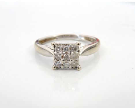 DIAMOND CLUSTER RINGthe diamonds totalling approximately 0.2cts, on nine carat gold shank, ring size K