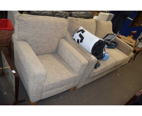 Two seater sofa and matching armchair and foot stool
