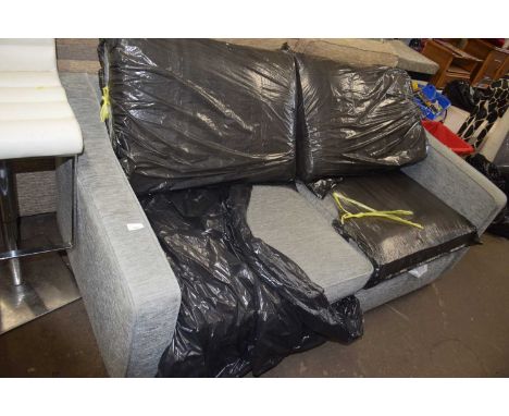 Grey upholstered sofa bed