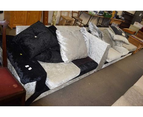Corner sofa and a matching foot stool