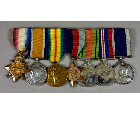 A Group of WWI and WWII Medals, awarded to R. Lewis comprising - 1914-15 Star, British War Medal, Victory Medal, 1939-45 Star