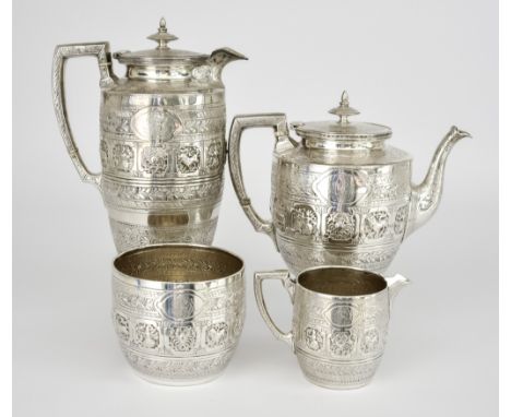A Victorian Scottish Silver Four-Piece Cylindrical Tea Service, by David Crichton Rait, Glasgow 1877, of Middle Eastern desig