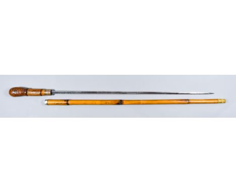 An English Sword Cane, with silver collar for London 1941, 27.5ins engraved bright steel blade, with bamboo grip and scabbard