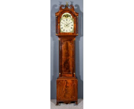 A 19th Century Mahogany Longcase Clock, the 12ins arched painted dial with Roman numerals, subsidiary seconds dial, date aper