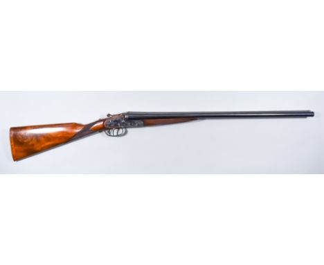 A 12 Bore Side by Side Shotgun, by AYA, Model "The Countryman", 28ins blued steel barrel with plain top rib, case hardened si