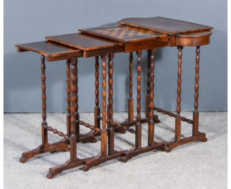 A Nest of Four 19th Century Rosewood Rectangular Occasional Tables, the largest with D shaped end compartments, on bobbin tur