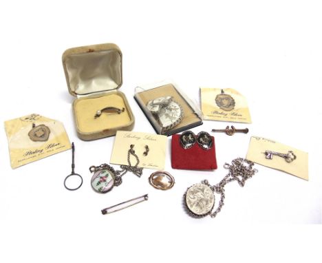 A COLLECTION OF SILVER AND SILVER COLOURED JEWELLERY including a cigarette holder ring