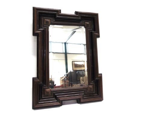 A BEVEL EDGE WALL MIRROR IN SHAPED AND MOULDED FRAME  45cm x 60cm overall