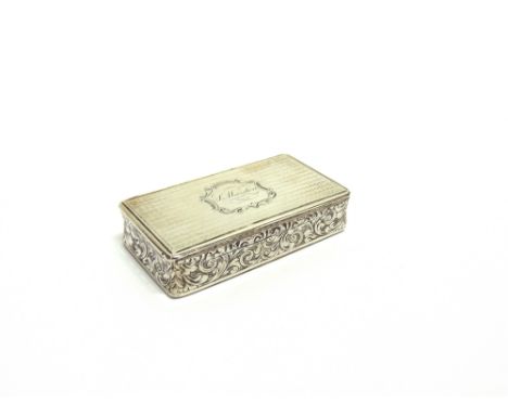 A VICTORIAN SILVER SNUFF BOX  by Edward Smith, Birmingham 1846, of rectangular outline, engine turned decoration, leaf scroll