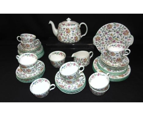 A COLLECTION OF MINTON 'HADDON HALL' TEAWARE  comprising eleven cups, sixteen saucers, fifteen tea plates, four side plates, 