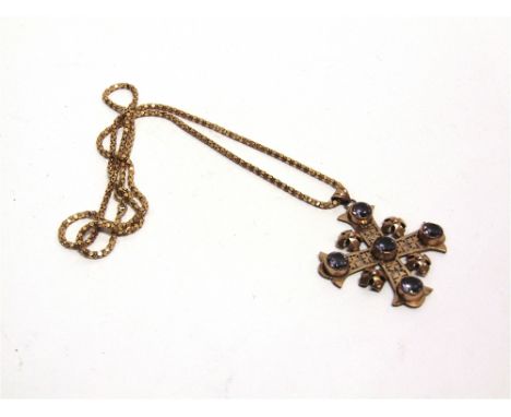 A JERUSALEM CROSS set with colour change synthetic corundums, unmarked, 5.2cm square; on a chain stamped '750' to the bolt ri