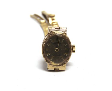 ROTARY, A 9 CARAT GOLD LADY'S MECHANICAL BRACELET WATCH presentation inscription to the case, 11g gross excluding the movemen