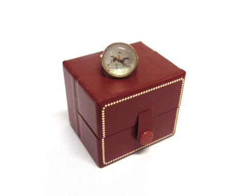 A REVERSE INTAGLIO RING  stamped '9ct', of a huntsman and horse jumping a fence, finger size M1/2, 6.8g, cased