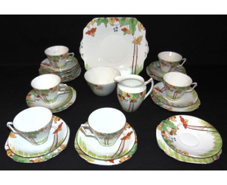 A COLLECTION OF ART DECO ROYAL ALBION CHINA TEAWARE  comprising six cups, eight saucers, ten side plates, sandwich plate, mil