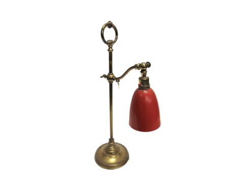 AN ADJUSTABLE BRASS STUDENTS LAMP 56cm high