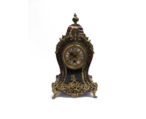 A FRENCH GILT METAL MOUNTED BOULLE TYPE MANTLE CLOCK  35cm high