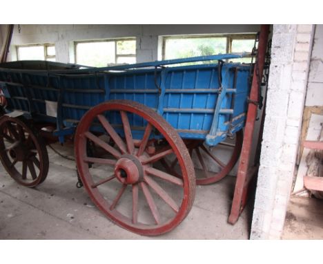 A Northamptonshire type spindle sided double shafted road wagon. Understood to have been built in 1893 by a village wheelwrig