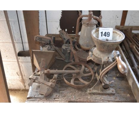 A small seed drill, blow torch, mincer and Tilley lamp