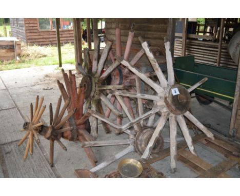 A quantity of vintage wheel centres and spokes etc. 