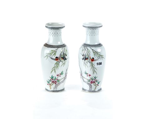 A PAIR OF EARLY 20TH CENTURY CHINESE REPUBLICAN PERIOD PORCELAIN VASES decorated with birds on boughs, caligraphy and black p