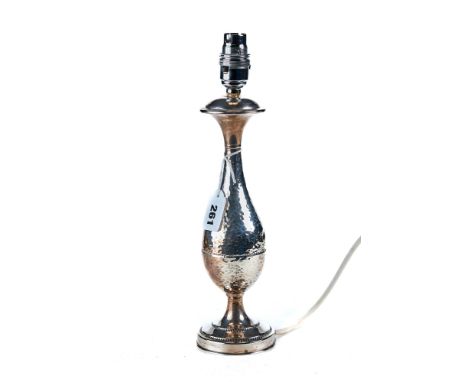 A CONTINENTAL STERLING SILVER SPOT-HAMMERED FINISH TABLE LAMP, 10 1/2 ins high, stamped 925.   