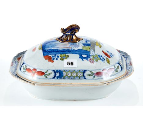 A 19TH CENTURY MASON'S IRONSTONE OBLONG TUREEN AND COVER decorated with panels of views and floral borders, blue printed mark