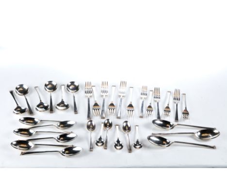 AN ELIZABETH II GARRARD &amp; CO SILVER SUITE OF CUTLERY, of tapering handle design, comprising:- Six soup spoons, six desser