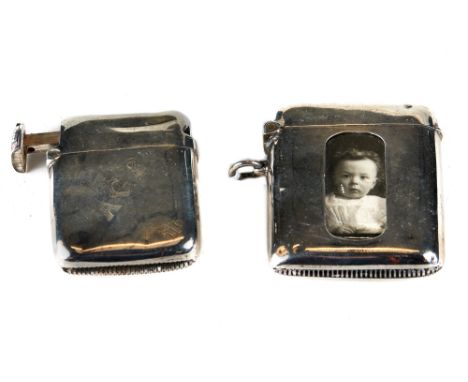 A LATE VICTORIAN "UNITY PATENT" SILVER VESTA CASE with integral cigar cutter to lid, maker:- H &amp; A, Birmingham 1894 and a