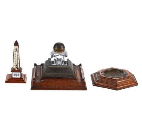 A LATE VICTORIAN OBELISK THERMOMETER with ivory scale, 6 1/2 ins high a ditto walnut INKSTAND, the square glass inkwell with 