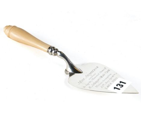 AN EDWARDIAN SILVER PRESENTATION FOUNDATION TROWEL, used to lay the memorial stone at St Andrews Mens Club, turned ivory hand