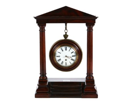 A LATE 18TH CENTURY CIRCULAR MAHOGANY INLAID AND BRASS BOUND SEDAN CLOCK, circular enamel dial and later movement, 6 ins diam