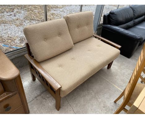 A RETRO WHITELEAF TEAK EXTENDING TWO SEATER SOFA 