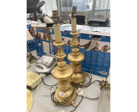 TWO HEAVY GOLD COLOURED LAMP BASES IN WORKING ORDER 